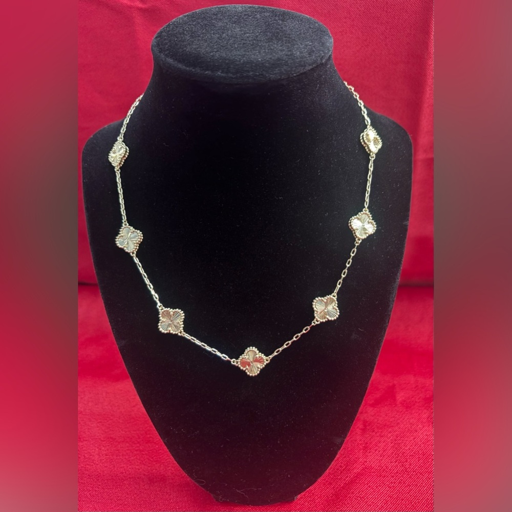 Elegant 14k filled over stainless steel clover necklace! Has 7 clovers!